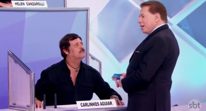 Carlinhos Aguiar e Silvio Santos. Foto: Reprodução de TV