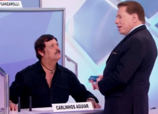 Carlinhos Aguiar e Silvio Santos. Foto: Reprodução de TV
